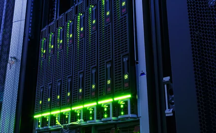 rack with blade behind bars mainframe in the data center