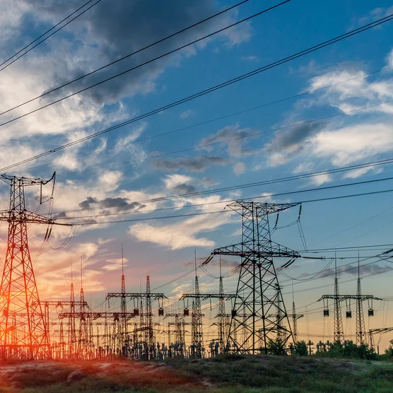 distribution electric substation with power lines and transformers.